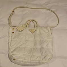 Reposhing This Item I Purchased From @Amanda_sands. Loved It, But Ready To Rotate For Something New. Questions? Leave A Comment Below! Nylon Tote Bag, Bags Prada, Nylon Tote Bags, Nylon Tote, Prada Bags, White Cream, Prada Bag, Cream White, Womens Tote Bags