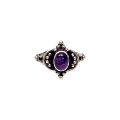 Sterling silver amethyst cabochon ring. Size 7 1/2 Oval bezel set amethyst cabochon in a bright purple color is surrounded by silver bead accents on a black oxidized background. Measures approx 5/8" high at front, center stone measures approx 7.5mm x 5.5mm. Weighs approx 4.5g, 2.9dwt Marked 925 Very nice condition with light tarnish and slight surface scratching. Will come packaged in a gift box or pouch (when possible) and will be shipped US Priority Mail with insurance. CL021324/17KCS Purple Amethyst Oval Cabochon Ring, Classic Amethyst Oval Cabochon Ring, Classic Purple Cabochon Rings, Oval Amethyst Cabochon Ring, Classic Cabochon Amethyst Ring, Classic Amethyst Cabochon Ring, Purple Oval Cabochon Hallmarked Ring, Hallmarked Oval Cabochon Amethyst Ring, Classic Silver Amethyst Ring Oval Cabochon