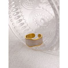 This golden metallic abstract design enamel BOHO open cut finger ring offers an exquisite and unique combination of vintage and bohemian style, perfect for the fashionista looking to make a statement. Its intricate design, crafted from luxurious enamel, adds a touch of sophistication and chic that will instantly elevate any outfit. Details Item Type: Fashion Rings Metal Type: Stainless Steel+Gold Plated Material: Enamel Size: 21*12mm Trendy White Open Ring, Unique Gold Enamel Ring, Minimalist White Metal Rings, Minimalist White Metal Ring, White Minimalist Midi Rings, Trendy Gold Enamel Open Ring, Trendy Open Enamel Ring As Gift, Trendy Gold Open Enamel Ring, Trendy Open Enamel Ring For Gift