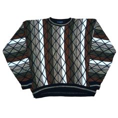 Vintage 90s Coogi Style Protege Crewneck Sweater - Classic Retro Knit Dive into the nostalgia of the 90s with this eye-catching vintage Coogi style crewneck sweater! Inspired by the iconic designs of Coogi Australia, this sweater features the same bold patterns and vibrant colors that defined an era. Perfect for fashion lovers who appreciate unique, statement pieces. Features: Era: 1990s Style: Coogi-inspired Material: High-quality acrylic blend (Soft, warm, and durable) Design: Multicolored, in Cable Knitwear, Unique Knitwear, 1990 Style, 1990s Style, Retro Sweater, 90s Looks, 1990s Fashion, Bold Patterns, Retro Mode