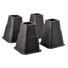 three black vases sitting next to each other