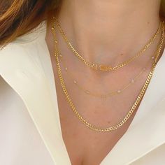 "Delicate 14k two-tone gold mooncut chain. Chain comes in 16-30 inches. Bright And Shiny Necklace Is Perfect For Any Occasion. Wear It Alone Or Layered. All Jewelry Is New And Inspected For Quality Assurance Item Detail: Metail: 14k two tone gold Width: 2.5mm Length: 16\" 18\" 20\" Closure: spring clasp * Prices vary according to the weight and length of the chain Thank You For Taking The Time And Visiting My Shop. I Hope You Enjoy My Pieces As Much As I Enjoyed Creating Them For You." Gold Diamond Necklace With Satellite Chain As A Gift, Gold Diamond Cut Charm Necklace Fine Jewelry, Yellow Gold Oval Link Satellite Chain Jewelry, Anniversary Gold Diamond-cut Station Necklace, Gold Diamond Cut Station Necklace, Gold Round Diamond Cut Station Necklace, Gold Tag Necklace, Cuban Link Choker, Shiny Necklace