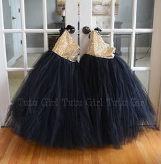 "Such a striking tulle dress! It's created in our true gold sequins with a black ribbon tie and black tulle skirt. The dress opens and closes at the top of the right shoulder. The bodice is fully lined. We offer the following sequin colors: gold, light gold, rose gold, blush pink, champagne, silver, white and black WANT A SEWN IN SLIP TO LINE THE TUTU? https://www.etsy.com/listing/125566641/add-a-slip-to-the-tutu-dress-sewn-in At checkout, please give us the following information: HOW TO ORDER: Gold Flower Girl Dress, Gold Flower Girl, Diy Tutu Dress, Tulle Skirt Black, Fluffy Skirt, Luxurious Dresses, Girls Tutu Dresses, Flower Girl Dresses Tutu, Girl Tutu