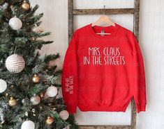 Sweatshirt will say: Mrs. Claus In The Streets.... Ho Ho Ho In The Sheets ( in white) All sweatshirts in red Sweatshirts are UNISEX Fit, if you have questions about sizing please refer to the sizing chart or feel free to ask me. Please select the size. Please feel free to send me a message with any questions! Thank you for looking! Griswold Family Christmas, Matching Sweaters, Design Text, Future Mrs, Childrens Christmas, Christmas Truck, Holiday Sweatshirt, Winter Sweatshirt, Hoodie Material