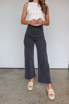 Our best-selling Devan denim jeans are back and in new colors! This high waisted, wide leg denim features a raw hemline and relaxed fit. These jeans pair well with bodysuits, crop tops, sweaters, you name it! Comes in mint, cream, olive (faded, deep green), dark green (vibrant dark green), black, chocolate brown, charc Soft-washed Wide Leg Pants For Spring, Soft-washed Wide Leg Bottoms For Fall, Fall Soft-washed Wide Leg Bottoms, Trendy Soft-washed Cotton Pants, Everyday Frayed Hem Bottoms For Fall, Versatile High Rise Flare Jeans For Fall, Everyday Fall Pants With Frayed Hem, Frayed Hem Bottoms For Fall, Frayed Hem Bottoms For Everyday Fall Wear