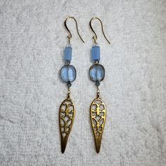 These Are Made With, - Light Blue Glass Beads - Clear And Light Blue Crystals Beads - Gold Colored Focus End Beads - Wire Wrapped In Brass Wire And Gold Filled Earhooks Handmade Light Blue Crystals, Diy Leather Earrings, Handmade Dangle Earrings, Crystals Beads, Mickey Mouse Earrings, Turquoise Stud Earrings, Earrings Handmade Dangle, Faux Pearl Earrings, Silver Wings