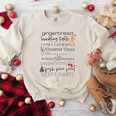 🎄❄️ Get cozy this holiday season with our favourite Christmas things sweatshirt! This cute women's holiday crewneck features festive and nostalgic Christmas traditions, perfect for adding a little cheer to your winter wardrobe. A thoughtful gift for teachers or anyone who loves a cozy winter pullover, it's the perfect way to spread holiday spirit while staying warm. Ideal for layering or lounging, this is your go-to sweater for a cute and comfy Christmas look! 👕 Ideal for any situation, a unis Christmas Sweater Quotes, Holiday Crewneck, Comfy Christmas, Nostalgic Christmas, Word Shirts, Tshirt Business, Christmas Words, Christmas Favorites, Christmas Things