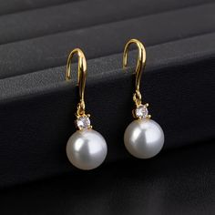 Brand New Women's Hanging Pearl & Diamond Earrings 18k Gold Plated Sterling Silver Genuine 2ct Lab Created Brilliant Cut Diamonds Real Natural Freshwater Pearls Measurements 1.4" Tall X .4" Wide Retail Price $300 Buy With Confidence From A Trusted Seller W/ A 99%+ Feedback Rating! A0284 (Id-1166-) Classic Yellow Gold Bridal Earrings With Elegant Design, Elegant Gold Round Cut Earrings, Elegant Round Cut Gold Earrings, Classic White Gold Bridal Drop Earrings, Classic Gold Diamond Earrings With Elegant Design, Elegant Prong Setting Earrings For Anniversary, Elegant Yellow Gold Round Earrings, Gold Plated White Gold Diamond Earrings For Formal Events, Classic Gold Plated Earrings With Elegant Design