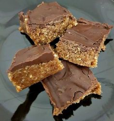 several pieces of cake on a white plate