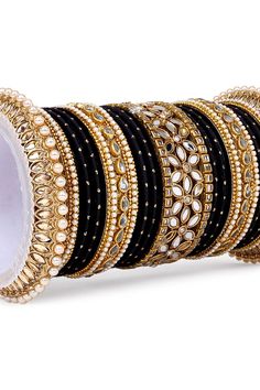 Introducing the Phenomenal Bridal Bangle Set made from robust Alloy Material. Complement your wedding look with the perfect accessory designed just for you. The set features a lovely Flower Mirror Kada, designed to offer a unique look that sets you apart. The Bangle set showcases an amazing finish that matches any outfit you wear on your big day. Add a touch of elegance to your bridal ensemble today! Bridal Bangle Set, Kundan Bridal Set, Bangles Bridal, Luxurious Accessories