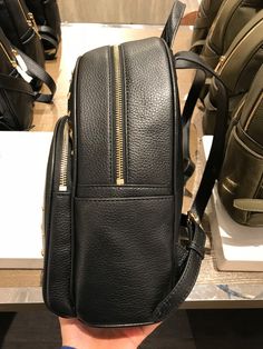 Michael Kors Women's Abbey Medium Studded Leather Backpack Black 35T8GAYB2L Pebbled leather with studded accent 100% polyester lining Gold tone hardware Zip closure Exterior features 1 zip pocket in front and 2 slide pockets on side Interior features 1 zip pocket, 1 large slip pocket and 2 multi-function slip pockets 23cm (W) x 30cm (H) x 11cm (D) Luxury Leather Backpack With Gold-tone Hardware For Travel, Luxury Leather Travel Backpack With Gold-tone Hardware, Luxury Leather Backpack For Travel With Gold-tone Hardware, Leather Backpack With Gold-tone Hardware For On-the-go, Luxury Leather Backpack With Gold-tone Hardware, Luxury Backpack With Gold-tone Hardware, Luxury Leather Backpack With Zipper For Daily Use, Designer Leather Backpack With Gold-tone Hardware, Leather Bags With Metal Zipper For Daily Use