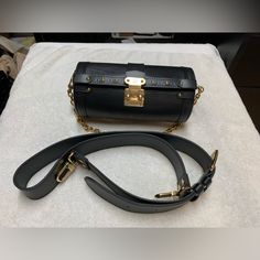 Excellent Condition. Looks Like Hardly Used. Has Some Creases On The Shoulder Strap From Being Folded. Comes With Original Receipt. Length: 8” Height: 4” Depth: 4” Shoulder Strap Drop: 18-22”” Chain Drop: 8” Chain And Strap Are Removable Luxury Top Handle Box Bag Fashion Accessory, Luxury Black Crossbody Box Bag, Luxury Black Box Bag For Travel, Luxury Black Satchel Box Bag, Luxury Black Box Bag With Gold-tone Hardware, Black Bags With Palladium Hardware, Designer Black Box Bag With Gold-tone Hardware, Luxury Black Box Bag With Branded Hardware, Black Luxury Box Bag For Everyday