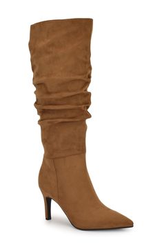 A slender heel and pointed toe define the seductive silhouette of a faux-suede boot finessed with a slouchy shaft. 3" heel 15" shaft, 14" opening circumference Partial side zip closure Textile upper, lining and sole Imported Classic Slippers, Faux Suede Boots, Flip Flop Slippers, Ugg Classic, Sweaters And Leggings, Suede Boots, Handbag Backpack, Boot Shoes Women