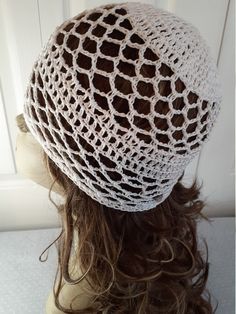 Women's Hat.  lacy crochet scull cap.   Med. / Lrg.   Lightweight for all seasons. Unique Vintage Design. Bamboo yarn very soft to touch.   Machine wash and dry. Hand crochet in my smoke free home. https://www.etsy.com/your/shops/MissEmsCloset One Size Crochet Lace Hat, Bohemian White Crochet Hat, White Bohemian Crochet Hat, White Bohemian Crochet Cotton Hat, Bohemian White Cotton Yarn Crochet Hat, White Yarn Crochet Hat For Festivals, White Crochet Hat One Size For Festival, White Crochet Hat For Festivals, White One-size Crochet Hat For Festival