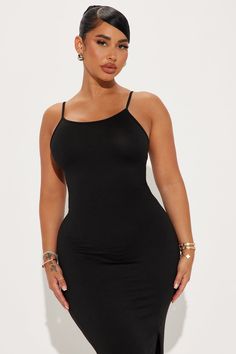 Sleek Sleeveless Seamless Dress, Sleeveless Black Seamless Dress, Sleeveless Seamless Black Dress, Seamless Sleeveless Black Dress, Black Stretch Bodycon Dress With Side Slits, Black Seamless Spaghetti Strap Bodycon Dress, Seamless Solid Sleeveless Mini Dress, Solid Color Seamless Sleeveless Mini Dress, Sleeveless Stretch Bodycon Dress With Side Slits