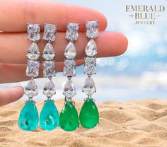 Elevate your style with our stunning Emerald Green Tear Drop Earrings  or unique Neon Blue Paraiba Tourmaline, this jewelry embodies elegance and vibrancy, making it perfect for celebrations and personalized gifts. - **Materials Sterling silver, genuine emerald green and neon blue tourmaline - **Size Lightweight and comfortable for all-day wear - **Customization Personalize with your choice of metal finishes These earrings are not only a beautiful addition to your collection but also crafted wit Pear-shaped Emerald Earrings For Wedding, Emerald Drop Earrings For Anniversary, Wedding Emerald Earrings Fine Jewelry, Emerald Drop Earrings For Wedding, Emerald Dangle Bridal Earrings Gift, Emerald Dangle Bridal Earrings, Tear Drop Earrings, Paraiba Tourmaline, Tourmaline Jewelry