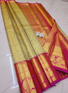 1.this is beautiful pure kanjivaram silk sari with running blouse piece  2.this sari is 5.5 mt length  3.this is a very elegant looking sari for all occasions like weddings and other formal events  4.fall n pico is complimentary  5.blouse can be made as per the requirements of the clients with proper measurements.stiching charges will be extra  6.plz check the availability of the sari before placing the order Gold Silk Mark Certified Saree For Wedding, Gold Wedding Saree Silk Mark Certified, Silk Mark Certified Paithani Silk Saree For Wedding, Silk Mark Certified Paithani Silk Traditional Wear For Wedding, Wedding Paithani Silk Saree Silk Mark Certified, Wedding Silk Mark Certified Saree, Kanjivaram Sarees, Silk Sari, Blouse Piece