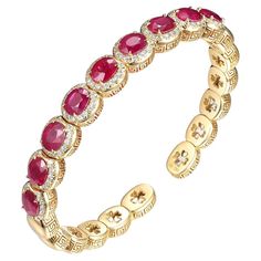 Introducing the stunning Ruby Diamond Steel Bracelet, now available in an open cuff design for added comfort and versatility. Crafted from high-quality 18 Karat Yellow Gold, this beautiful bracelet features 9 oval rubies, weighing a total of 7.55 carats, and is delicately accented with sparkling diamonds, weighing a total of 1.13 carats. The rubies are expertly cut and polished to showcase their natural beauty and rich color, and the diamonds are set to catch the light and add a touch of luxury Luxury Classic Oval Cuff Bracelet, Luxury Ruby Gemstone Bangle, Luxury Adjustable Red Bangle, Cuff Design, Cuff Bangle Bracelet, Ruby Diamond, Cuff Bangles, Belleza Natural, Sparkle Diamonds