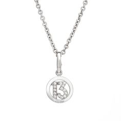 Estate Cartier diamond "13" lucky charm & necklace crafted in 18 karat white gold. 14 diamonds total an estimated 0.10 carats (estimated at G-H color and VS1-2 clarity). The diamond set lucky "13" charm come with a 17" Cartier 18k white gold chain. The necklace is great worn alone or layered with your fine necklaces from any era.  The necklace is in very good original condition and was cleaned and polished. Particulars: Weight: 10.9 grams Stones:  14 diamonds total an estimated 0.10 carats (estimated at G-H color and VS1-2 clarity). Size & Measurements: The necklace measures 17 inches. The '13' charm measures 1 x 1/2 inch (including the bale). Metal & Hallmark: 18k white gold. The charm and necklace are each hallmarked "750" for 18 karat gold and "Cartier" along with the serial number. Fine Jewelry Silver Charm Necklace With Cable Chain, Silver Fine Jewelry Charm Necklace With Cable Chain, Fine Jewelry Silver Charm Necklaces With Cable Chain, Luxury Silver Diamond Necklace With Cable Chain, Classic White Gold Charm Necklace For Anniversary, Luxury Silver Charm Necklace For Anniversary, Classic White Gold Charm Necklaces For Anniversary, White Gold Initial Pendant Necklace With Charms, Luxury Silver Charm Necklaces For Anniversary