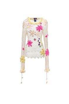 a white top with pink flowers on the front and yellow trimmings around it