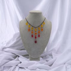 Gunmetal chain with beautiful red, orange and yellow gems combine in this fire inspired piece. Flame Necklace, Fire Necklace, Cosplay Jewelry, Yellow Gems, Jewelry Gothic, Necklace Gothic, Fire Element, Gothic Necklace, Bib Necklaces