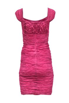 Be the best dressed guest in this flirtatiously pink Nicole Miller dress! Its textured fabric and contrast hem guarantees you'll be pretty in pink and ready to take on any occasion! Pucker up ladies, because this dress is a total head-turner! This colorful and sassy dress just needs some stiletto heels, statement jewelry, and a luxe clutch bag to complete your look this social season! Size 2 Shell 41% Metal, 34% Viscose, 20% Nylon, 5% Spandex Lining 100% Polyester Sleeveless Invisible zipper bac Pink Dresses With Ruched Back, Pink Party Dress With Ruched Back, Chic Pink Dress With Ruched Back, Pink Elegant Mini Dress With Ruched Back, Pink Mini Dress With Pleated Bodice For Formal Occasions, Elegant Pink Mini Dress With Ruched Back, Pink Ruched Knee-length Mini Dress, Elegant Pink Dress With Ruched Back, Flirty Pink Dress With Ruched Back