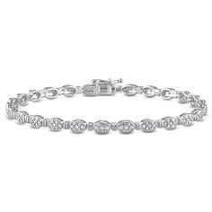 This pretty tennis bracelet is crafted in lustrous sterling silver and features pave-set diamonds placed in a cluster pattern in oval motifs. Enhanced with a high polished finish, this diamond bracelet makes a valuable addition to any jewelry collection. Coordinate this bracelet with any casual or business attire and look stunning. The diamonds are 1/2ctw, J or better in color, and I3 in clarity. This bracelet measures 7.5 inches in length and 3.8mm in width. Luxury Oval Link Bracelet With Diamond Accents, Classic Oval Bracelets With Diamond Accents, Anniversary Oval Link Diamond Bracelet, Luxury Diamond Bracelet With Oval Link And Diamond Accents, Luxury Diamond Bracelet With Oval Link Accents, Luxury Oval Link Diamond Bracelet With Accents, White Gold Diamond Bracelet With Jubilee Oval Link, Luxury Diamond Oval Link Bracelets, Classic Oval Link Diamond Bracelet For Anniversary