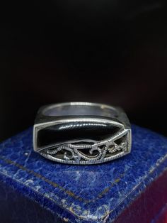 This stunning vintage ring has a beautiful Florally art deco influenced design set with natural black onyx gemstone in sterling silver marked 925 UK size - U US size - 10 Message me any questions  ITEM - S2149 Design Floral, Black Onyx, Rings Statement, Vintage Rings, Onyx, Statement Rings, Design Art, Sterling Silver Rings, Jewelry Rings