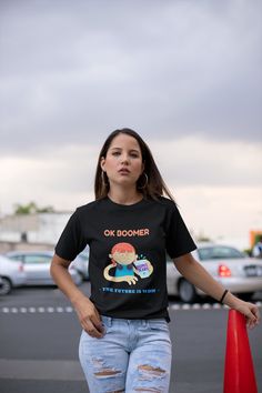 "Ok Boomer The Future Is Now T Shirt, Funny T Shirt, Graphic Womens T-Shirt, Baby Boomer T-Shirt If you have a teenager then you've probably heard them say \"Ok Boomer\" the future is now.  I know my daughter says it to me all of the time! If you're looking for a Funny T Shirt then this one will fit the bill.  I get a chuckle every time I wear it.  Cool thing is that anyone that sees you in this womens graphic t-shirt that has a teenager will know exactly what it means. This hilarious baby boomer t-shirt is made from quality material and is built to last. You've now found the staple t-shirt of your wardrobe. It's made of a thicker, heavier cotton, but it's still soft and comfy. And the double stitching on the neckline and sleeves add more durability to what is sure to be a favorite!   PLEA Novelty Short Sleeve Streetwear T-shirt, Novelty Cotton T-shirt With Short Sleeves, Novelty Cotton Short Sleeve T-shirt, Novelty Short Sleeve T-shirt With Letter Print, Novelty Short Sleeve T-shirt With Cartoon Print, Novelty Cartoon Print Short Sleeve T-shirt, Novelty Short Sleeve Tops For Streetwear, Fun Slogan T-shirt With Short Sleeves, Fun Short Sleeve T-shirt With Funny Text