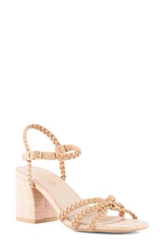 Braided straps and a woven block heel bring abundant texture to this breezy sandal. 2 3/4" heel Adjustable ankle strap with buckle closure; hidden elastic inset Synthetic upper, lining and sole Imported