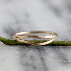 This delicate yet striking ring is made from one piece of hammered metal which wraps one and a half times around your finger, giving the appearance of two wavey stacking rings, yet maintaining the negative space between each band. The ring is wrapped and then soldered closed so it maintains both its shape and size. It has a lovely subtle hammered texture which adds dimension and sparkle. Available in sterling silver and 14k gold fill, as well as solid 14k gold in yellow and rose. sizes 5-9. All Minimalist Silver Ring, Hammered Silver Ring, Minimal Ring, Two Rings, Bohemian Ring, Half Time, Wrap Ring, Hammered Metal, Bohemian Rings