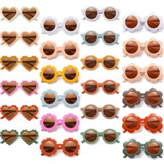 PRICES MAY VARY. Various Patterns: you will get 24 pieces of baby sunglasses in total, which are available in multicolor, including 4 different shapes, namely round, flower, sunflower and rippled heart, 6 pieces of each shape; The rich styles can satisfy your babies various demand Sturdy and Lightweight: our lovely baby boy sunglasses are made of quality acrylic and PC, sturdy and hard, not easy to break, comfortable and lightweight to wear, no worry about that the long time using will cause too Adjustable Plastic Sunglasses For Playtime, Boys Sunglasses, Flower Sunflower, Baby Sunglasses, Flower Sunglasses, Cute Frames, Round Flower, Heart Sunglasses, Girl With Sunglasses