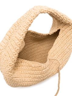 a crocheted bag is shown on a white background, with the handle open