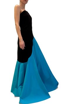 This gown is in stock in Black/Celadon in an XS and Black/Turquoise in a M. All other sizes and colors are Special Order. Special Order takes 22 - 26 weeks from order to shipment. True to size. 68% polyamide | 32% elastane Made in Toronto | Fabric milled in Italy Dry Clean Only *Note that Special Order pieces take 22 - 26 weeks to ship. Elegant Fitted Turquoise Maxi Dress, Elegant Fitted Turquoise Gown, Elegant Floor-length Turquoise Gown, Elegant Turquoise Floor-length Gown, Elegant Turquoise Cocktail Dress, Elegant Turquoise Dress With Fitted Bodice, Turquoise Fitted Floor-length Gown, Elegant Turquoise Evening Gown, Fitted Turquoise Floor-length Gown