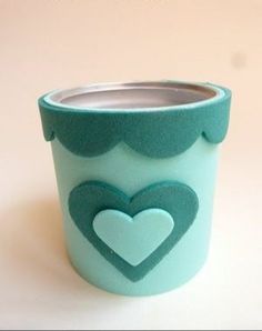 a cup that has been made to look like a cup with hearts on the side