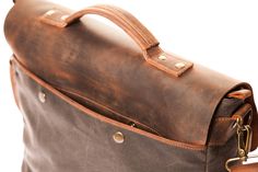 "This is a messenger bag like you've never seen before, made of waxed canvas and saddle leather. It's perhaps a men's bag, but who am I to tell? Anyone can wear it and the bag will be happy to welcome any laptop up to 15 inch. If your laptop is bigger you can choose the 17 inch version of the bag. I used the finest British waxed canvas to make this messenger bag and I am happy to say I created another extraordinary product. The shades it gets over time make the waxed canvas a special fabric. And Men Laptop Bag, Mens Leather Satchel, Messenger Bag For Men, Mens Satchel, Laptop Bag Men, Canvas Satchel, Bag For School, Computer Bag, Leather Satchel Bag