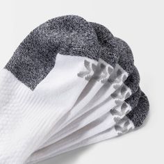 Why we're ALL IN: A must-have staple in your workout wardrobe, these ankle athletic socks are designed to keep your feet cool and comfy — thanks to a moisture-wicking fabric with ventilating mesh. The socks are thoughtfully created with arch support as well as zone cushioning on areas of the feet that need it the most, as well as having smooth toe seams and a reinforced heel and toe. Plus, the neutral color options and ankle cut make for versatile wear for a variety of activities. When families Functional Slip-resistant Gym Socks, Breathable Comfortable Gym Socks, Comfortable Sporty Socks For Sports, Breathable Comfortable Socks For Gym, White Slip-resistant Training Socks, Fade-resistant Stretch Sports Socks, Breathable Casual Gym Socks, Breathable Comfortable Sports Socks, Breathable Casual Socks For Gym