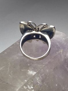 "Butterfly ring mother of pearl sterling silver women girls Size 6.75. Between a size 6.75 and a size 7 Length 7/8\" Width 1\" Thinnest 5/32\" Free Shipping & Free Postal Insurance Delivered in a Gift Box If you do not want the ring polished and want to leave the natural patina please let me know at the time of purchase as I do polish rings before I ship rings out. Thanks Free First Class shipping and postal insurance is included. If you want to upgrade to priority kindly pay an additional f Formal Rings With Inlay, Fine Jewelry Ring With Inlay As A Gift, Fine Jewelry Ring With Inlay For Gift, Fine Jewelry Ring With Inlay Perfect As A Gift, Fine Jewelry With Inlay For Anniversary, Sterling Silver Butterfly Ring For Wedding, Unique Sterling Silver Butterfly Ring For Wedding, Silver Wedding Rings For Mother's Day, Vintage Pearl Ring With Gemstone