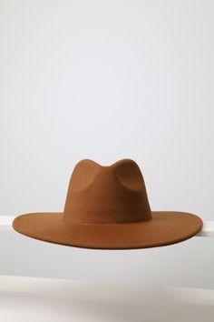 Enhance your style this fall and winter with our large wide brim solid color Fedora - it comes with 18 different colors and its quality and structure of hat for both fashion and functionality. Size: Brim: 4 inches wide Size: Large Hat Size: 7.1/4 - 7. 5/8 Inches: 22.75- 23 CM: 58-59 Key Features: Classic Solid Colors: This plain fedora serves as a blank canvas, allowing you to customize and design it to suit your unique style. Versatile Fashion: The timeless design of this Classic Fedora is perf Brown Fedora, Large Hat, Fedora Hats, Large Hats, Fedora Hat, Blank Canvas, Wide Brimmed, Hat Sizes, Fall And Winter