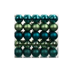 green and teal christmas ornaments are arranged in a row on top of each other