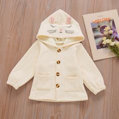 Pattern: solid color, cartoon Color: beige Height: 90CM, 100cm, 110cm, 120cm, 130cm Sleeves: long sleeves Thickness: normal Fabric: Cotton Gender: girl Launch: Winter 2021 Season: spring, autumn and winter Toddler Coats Girl, Solid Sweaters, Patches Jacket, Beige Sweater, Toddler Kids, Kids Sweater, Fashion Tops, Kids And Parenting, Hooded Jacket