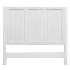 a white headboard with four paneled doors on the top and bottom panels, against a white background