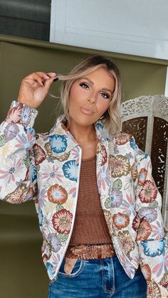 A statement piece! Make a statement wherever you go in our Full Of Color Floral Print Tapestry Cropped Jacket! This jacket is featured in a retro floral print with a cropped fit and collared neckline. This jacket is going to be your GO TO this fall! Retro floral printed jacket Tapestry cropped jacket Collared neckline Zip up front Elastic bottom Elastic Cuffs Lined Fabric: 70% Cotton, 30% Polyester Measurements: Measured lying flat S: Bust: 41 1/4” | Length: 19 1/4” M: Bust: 42” | Length: 20 1/4” L: Bust: 42 1/2” | Length: 21 1/4” Model Specs: Karli + Emily are wearing a size small in the photo.How will this item fit you? Check out our MODEL SPECS (Typical Sizing - Karli: S-Size 5/26 - 5ft 2in, Emily: S-Size 3/25 - 5ft 5in, Syd: L/XL- Size 15/ - 5ft 8in)Need help with sizing? No problem! J Retro Floral Print Winter Outerwear, Vintage Printed Outerwear For Spring, Fall Floral Print Multicolor Embroidered Outerwear, Fall Floral Print Outerwear With Multicolor Embroidery, Fall Multicolor Embroidered Floral Outerwear, Fall Outerwear With Multicolor Embroidery And Floral Print, Vintage Cropped Outerwear For Spring, Multicolor Floral Print Long Sleeve Outerwear, Multicolor Embroidered Floral Print Long Sleeve Outerwear