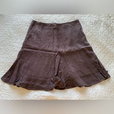 Linen Skirt By Blue Dot Los Angeles Size 12. Waist Measures 32”. Length Is 23”. Excellent Unused Condition. Has Never Been Worn Or Washed. Zippered Side With A Button & Loop. Inside Lining. Sorry The Pics Are Not Great, Lighting Issue. This Is A Dark Brown. No Rips, Tears Or Fading. Excellent New Condition. Brown Mini Skirt For Summer, Brown Stretch Lined Skirt, Brown Skirted Bottoms For Summer, Brown Short Skirt For Summer, Summer Brown Short Skirt, Summer Brown Short Length Skirt, Short Relaxed Lined Skirt, Fitted Brown Skirted Bottoms, Solid Short Flowy Skirt