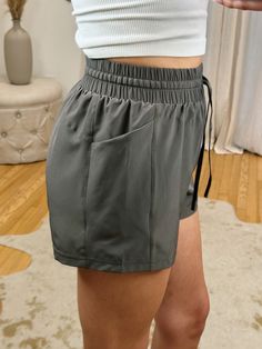 The perfect pair of athletic shorts! High waisted, stretchy elastic waist band + drawstring. Not see through & a great length! Available in plus sizes! Maclaine is 5’7 wearing a size small. True to size and stretchy. Gray Gym Shorts With Elastic Waistband, Athleisure Gray Shorts With Elastic Waistband, Gray Activewear With Elastic Waistband Shorts, Athleisure Shorts With Elastic Waistband And Short Inseam, Athleisure Shorts With Elastic Waistband, Stretch Drawstring Workout Shorts, Stretch High-waisted Shorts With Elastic Band, Gray Athletic Shorts With Elastic Stretch Waistband, Gray Drawstring Sports Shorts