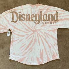 Disneyland Resort Rose Gold Pink Tie Dye Spirit Jersey. New With Tags Never Worn No Damages. Relaxed Fit. Long Sleeve Round Neck. Rose Gold Pink Tie Dye Printed Body With Rose Gold Glitter Raised Lettering. Size Xs. 100% Cotton Machine Wash Cold. Purchased At Disneyland Resort. Tie Dye Disney, Spirit Jersey, Disney Tees, Paris Woman, Thermal Shirt, Rose Gold Pink, Tie Dye Long Sleeve, Pink Tie, Shirt Embroidery