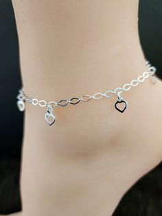 925 Sterling Silver Plain Heart Charm Ankle-Bracelet Real 925 Sterling Silver NOT SILVER PLATED High Quality Silver Bracelet   High polished rhodium finish gives this bracelet a stunning shiny look that lasts many years. We have hundreds Silver Jewelry in stock. If you don't see what you are looking , feel free to ask us.   Trendy, dainty, luxurious, classic with modern touch, elegant and fancy, fine quality made   925 Sterling Silver dangling heart anklet-bracelet.  Description 925 Sterling Sil Adjustable Heart Metal Anklets, Adjustable Heart-shaped Metal Anklet, Heart-shaped Metal Anklets For Gift, Heart-shaped Metal Anklets As Gift, Silver Adjustable Heart-shaped Anklets, Adjustable Silver Heart Anklets, Elegant Silver Anklets For Valentine's Day, Metal Dangle Anklets As Gift, Elegant Silver Anklets With Heart Charm