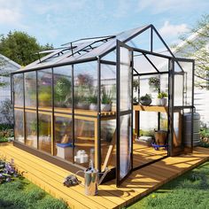 a small greenhouse is shown in the middle of a yard with flowers and potted plants