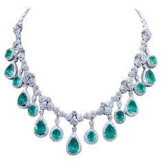 A magnificent piece of Italian art , a very fabulous design, sophisticated and refined, a glamour and fashion collection, perfect for elegant ladies. Necklace come in 18k gold with 7 pieces of natural Zambian Emeralds in pear cut of 20,75 carats , fine quality, amazing color, CEO Minor, and 8 pieces of natural Zambian Emeralds in oval cut of 15,44 carats, fine quality, spectacular color , CEO Minor , and 763 pieces of natural diamonds in special cut of 20,55 carats, F color VS clarity, very sparkly . Piece of high jewelry. Handcrafted by artisan goldsmith. Excellent manufacture and quality. Complete with AIG certificate. Whosale price. Note: on my shipment, no taxes. Ladies Necklace, 18k Gold Necklace, Elegant Ladies, Zambian Emerald, Italian Art, Dream Jewelry, High Jewelry, Pear Cut, Elegant Woman