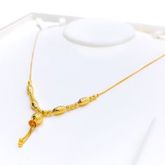 This bold 22k gold necklace exudes elegant sophistication, making it a standout piece for any refined ensemble. Weighing 8.1 grams, it offers a lightweight yet luxurious feel. The radiant yellow gold finish enhances its timeless beauty and striking appeal. With a necklace length of 18.5 inches and a drop length of 1 inch, this piece is designed to complement your neckline with grace. The secure lobster lock ensures confident and comfortable wear. Elevate your jewelry collection with this exquisitely crafted necklace, ideal for bringing a touch of bold elegance to both everyday and special occasions. PRODUCT DETAILS Gold Purity(karat): 22k Gold Weight(grams): 8.1 Item Finish: Yellow Gold Necklace Length: 18.5" Drop Length: 1" Lock Style: Lobster Lock 22k Yellow Gold Chain Necklace For Wedding, Elegant 22k Gold Chain Necklace Gift, 22k Gold Jewelry With Delicate Chain, 22k Gold Necklace With Delicate Chain, Elegant Yellow Gold Plated Necklaces, Elegant Gold Necklace With Delicate Chain, Elegant 22k Yellow Gold Necklace, Elegant Yellow Chain Necklace For Formal Events, Formal 22k Gold Chain Necklace